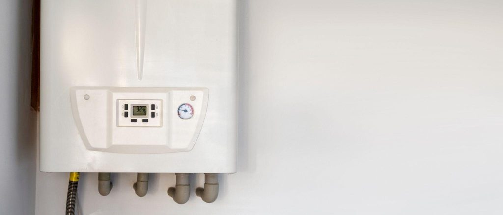 A close up of a gas boiler highlights features like the energy efficiency label and control panel for guidance